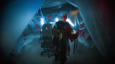 Cyberpunk Man Typing Code on Invisible Interface, Then Programming on Computer Stock Footage 327638455