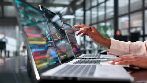 Cybersecurity Analyst Carefully Monitors Network Threats Stock Footage 340405436