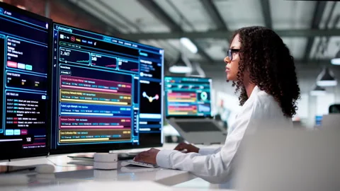 Cybersecurity Analyst Carefully Scans Network Data Stock Footage 340406009