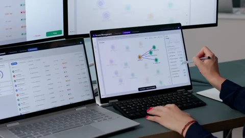 Cybersecurity Analyst Managing User Access With Laptop Stock Footage 340402625