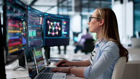 Cybersecurity Analyst Monitors Network Threats Stock Footage 339897106