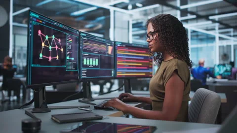 Cybersecurity Analyst Monitors Network Threats, Protecting Data Stock Footage 339909634