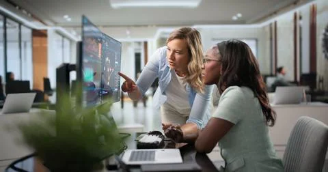 Cybersecurity Analyst Monitors Network Threats Using Advanced Software Tools. 写真素材