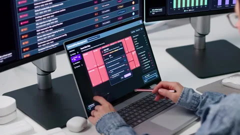 Cybersecurity Analyst Monitors Vulnerabilities While Scanning Network Stock Footage 347908275