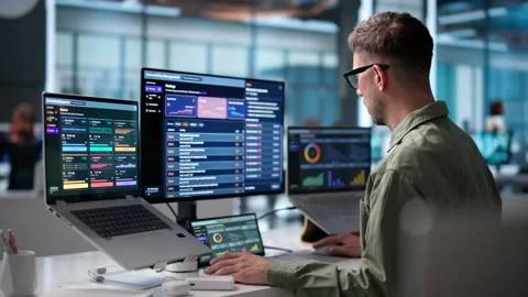 Cybersecurity Analyst Reviews Threat Detection Data On Laptop Stock Footage 340398245