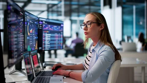 Cybersecurity Analyst Using Computer Stock Footage 340400727