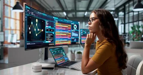 Cybersecurity Analyst Woman Uses Laptop To Detect Network Threats Efficiently Stock Photos