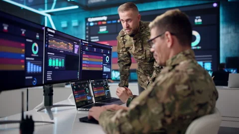 Cybersecurity Analysts Collaborate In Office Using Software Tools Stock Footage 337224027
