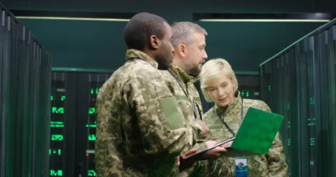 Cybersecurity in army concept. Mixed-races male and female military officials Video stock 131364616