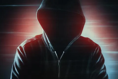 Cybersecurity, computer hacker with hoodie Stock Photos