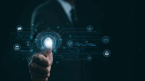 Cybersecurity concept. Businessman using thumb to scan fingerprint, Stock Photos