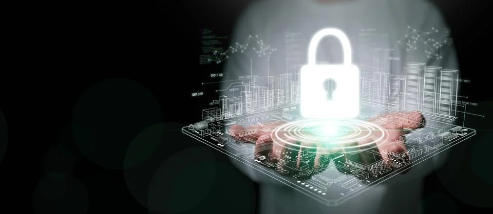 Cybersecurity concept. A man with both hands holding glowing padlock icon o.. Stock Photos