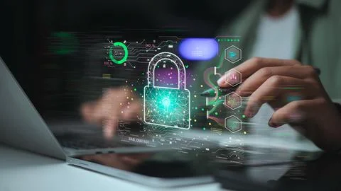 Cybersecurity concept with person using laptop protected by digital padlock.. Stock Photos