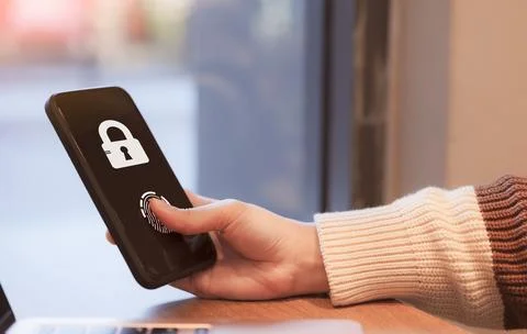 Cybersecurity concept. User log in to access smartphone. Biometric, Stock Photos