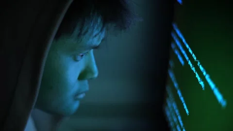 Cybersecurity Developer Close Asian Man Computer Screen Light Reflection Hoodie Stock Footage 336094239