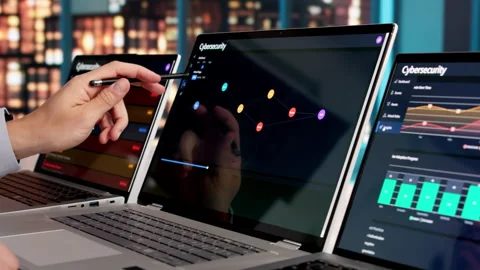 Cybersecurity Engineer Carefully Monitors Computer Network Stock Footage 332500428