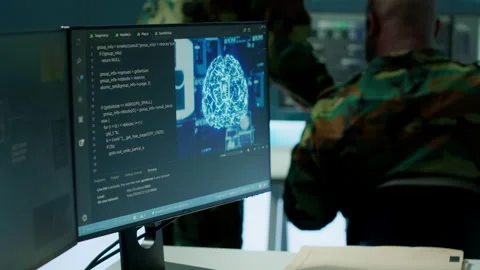 Cybersecurity expert oversees intelligence gathering through AI brain Stock Footage 279950950