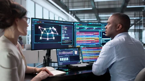Cybersecurity Experts Analyze Malware Threats Stock Footage 343881904
