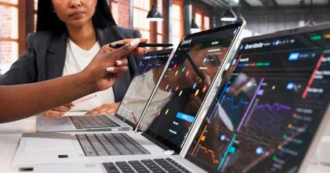 Cybersecurity Experts Work Closely Together On Laptop Improving Network Prote Stock Photos