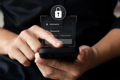 Cybersecurity internet and networking concept. Close up of hand holding smart Stock Photos