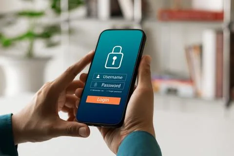 Cybersecurity internet and networking concept. Close up of hand holding smart Foto stock