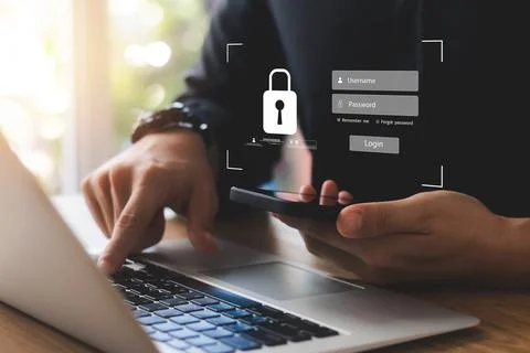 Cybersecurity internet and networking concept. Close up of hand holding smart Foto stock