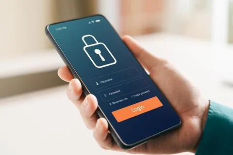Cybersecurity internet and networking concept. hand holding smartphone info.. Stock Photos
