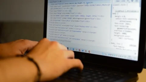 Cybersecurity on laptop. web developer on pc monitoring code for cybersecurity. Stock Footage 234503021