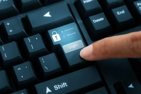 Cybersecurity login, secure login using computer keyboard with padlock icon.. Stock Photos