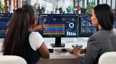 Cybersecurity Manager Leads Team Analyzing Threats Using Advanced Software To Stock Photos