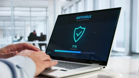 Cybersecurity Software Protects Man's Laptop Stock Footage 328394916