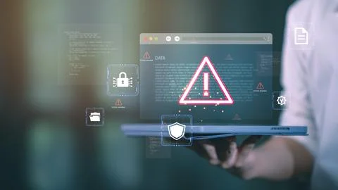 Cybersecurity warning alert on tablet screen with digital lock, shield icon.. Stock Photos