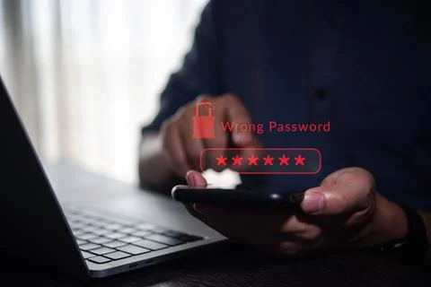 Cybersecurity warning with wrong password error message on smartphone scree.. Stock Photos