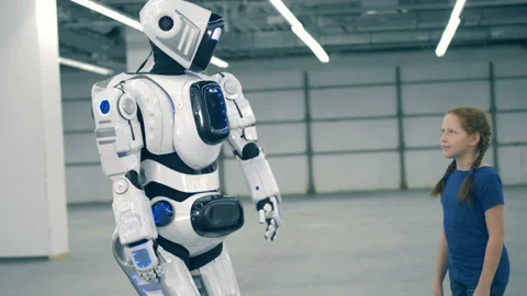 Cybrog is giving a high-five to a little girl Stock Footage 101982385