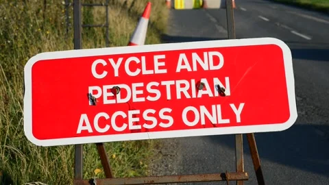 Cycle and pedestrian access only on road ahead united kingdom Stock Footage 154454380