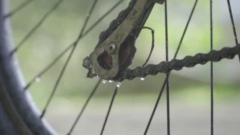 Cycle being washed with water slow motion  washing bicycle kids Video stock 129846041