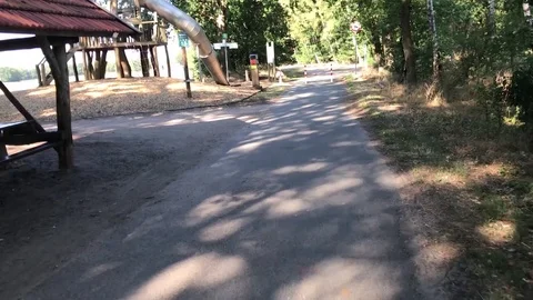 Cycle path along the border between the two countries. Straight on across the b 動画素材 113481442