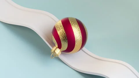 Cycled 3d animation, striped red gold glass ball rolls the endless wavy path Stock Footage 220799386