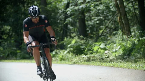 Cycler in the forest Stock Footage 54073513