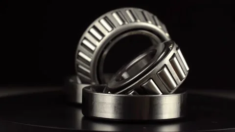 Cyclic seamless video with bearings rotating on turntable on a black background. 動画素材 154874250