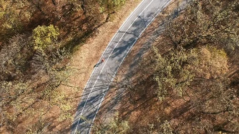 Cycling from above Stock Footage 98360363