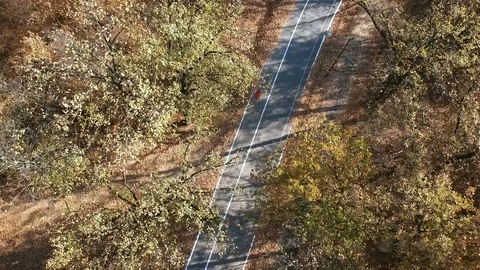 Cycling from above Stock Footage 98364295
