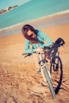 Cycling on beach Stock Photos
