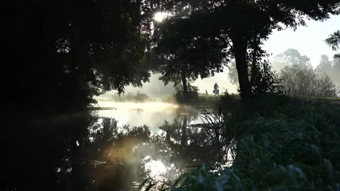 Cycling at dawn Stock Footage 230417715