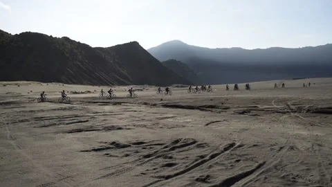 Cycling in the desert Stock Footage 148162100