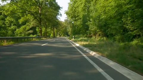 Cycling on empty road Video stock 267128584