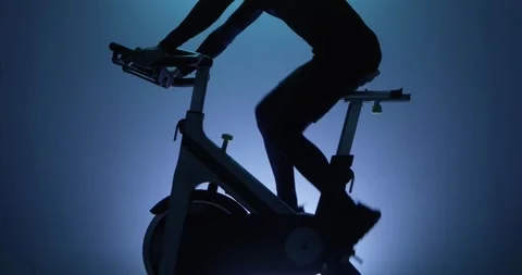 Cycling on an exercise bicycle Stock Footage 314503955