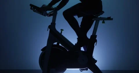 Cycling on an exercise bicycle Stock Footage 314503960
