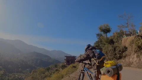 Cycling in the Himalayas Stock Footage