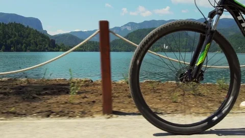 Cycling by the lake Bled Stock Footage 81266857